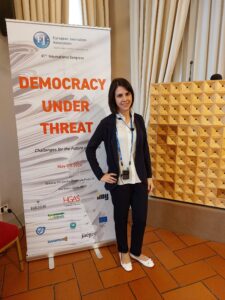 Eleonora Monoscalco provides English-to-Italian interpreting services at an event